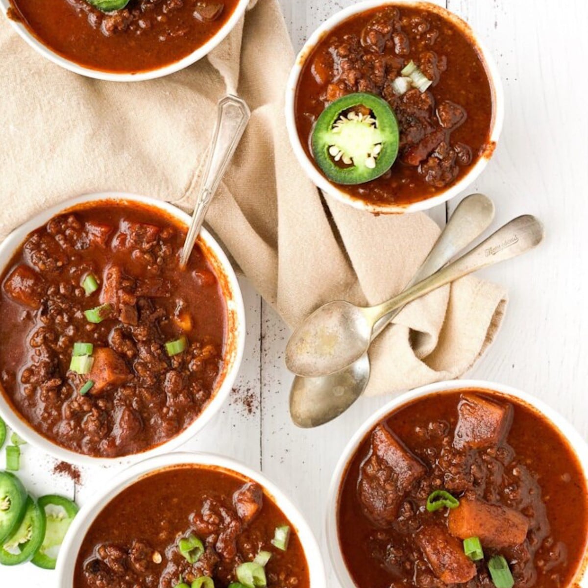 Bowls of hearty and thick chili with no beans.