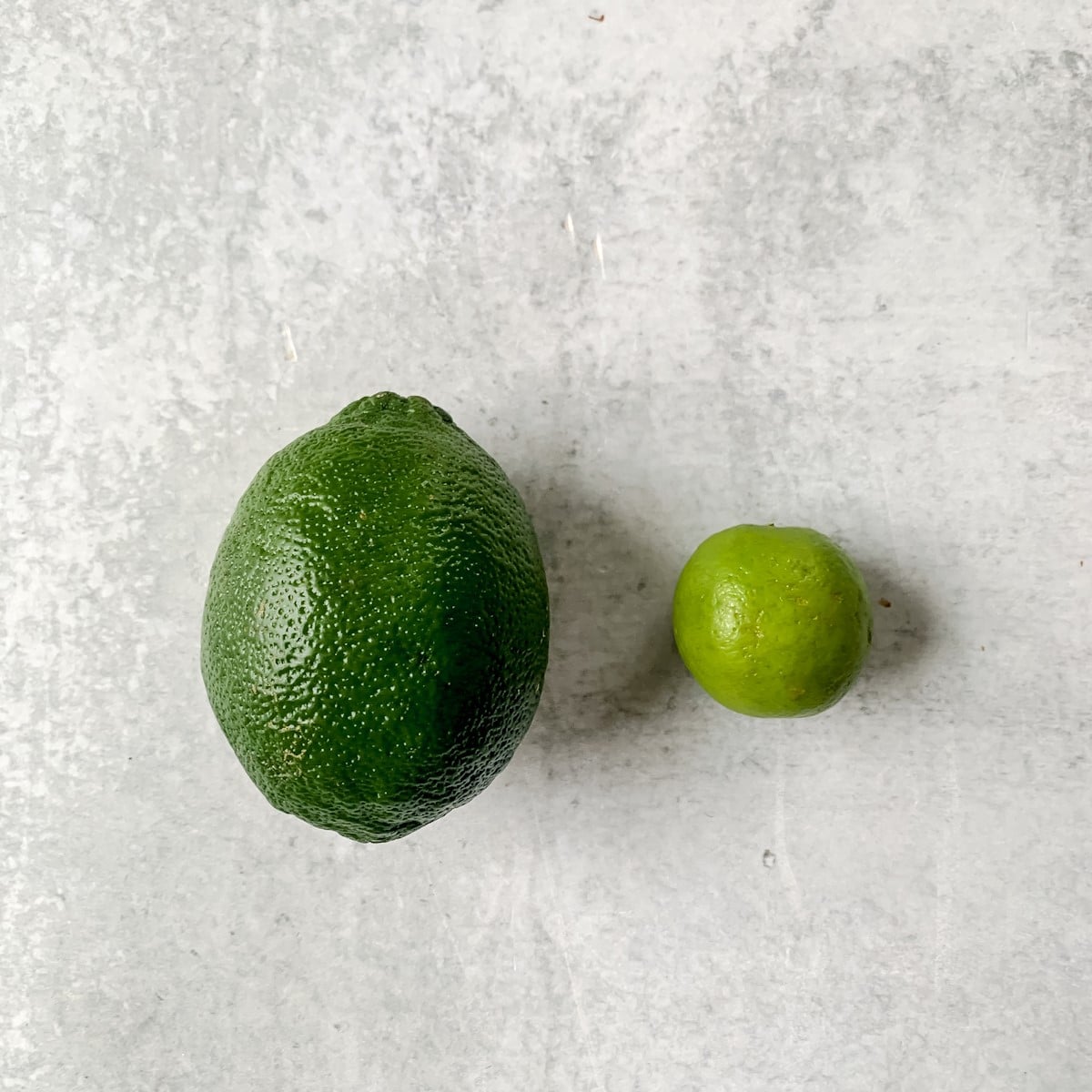 Regular lime and key lime side by side.